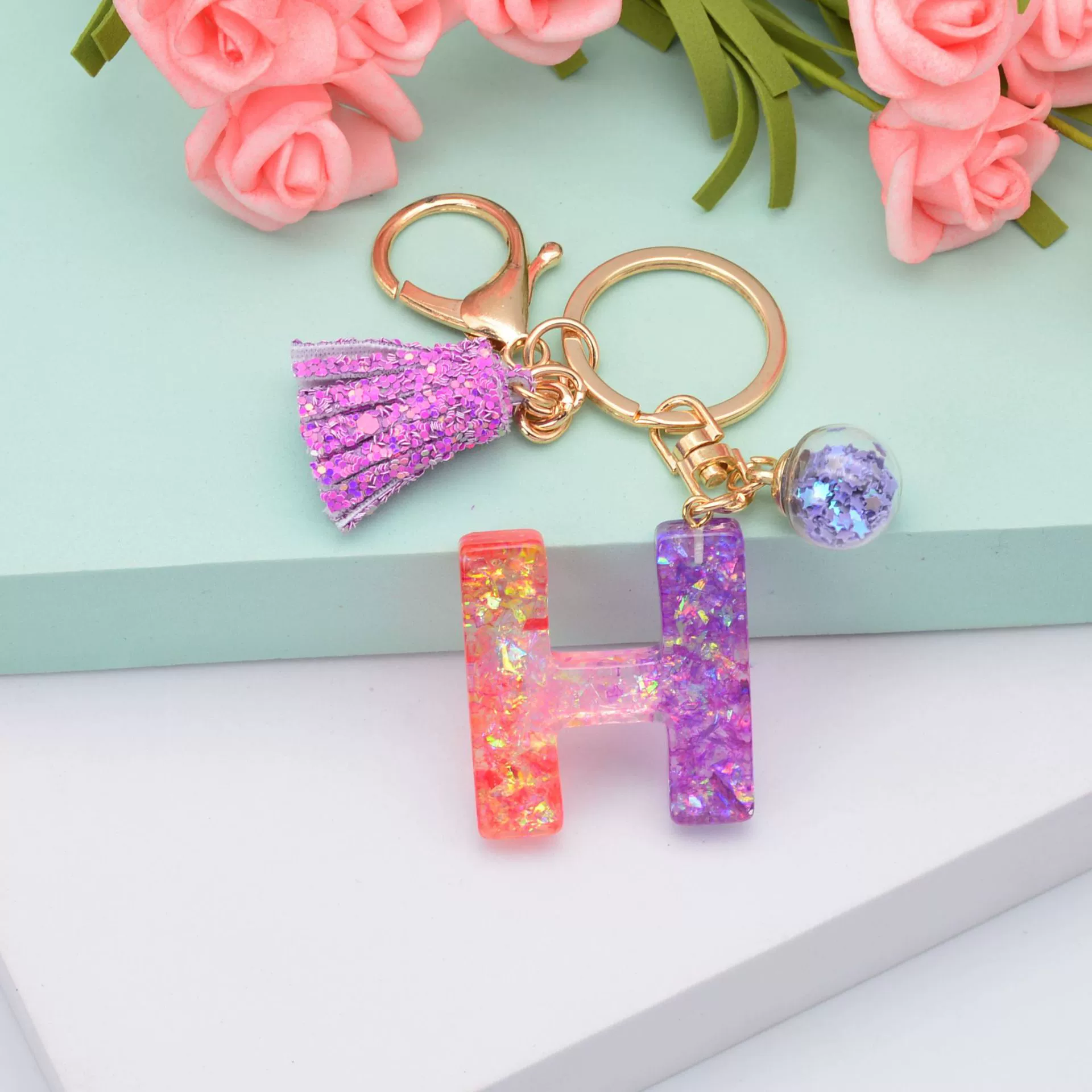 新款闪粉流苏字母钥匙扣水晶滴胶紫色葱粉挂件女士包包小礼品配饰  87详情图8