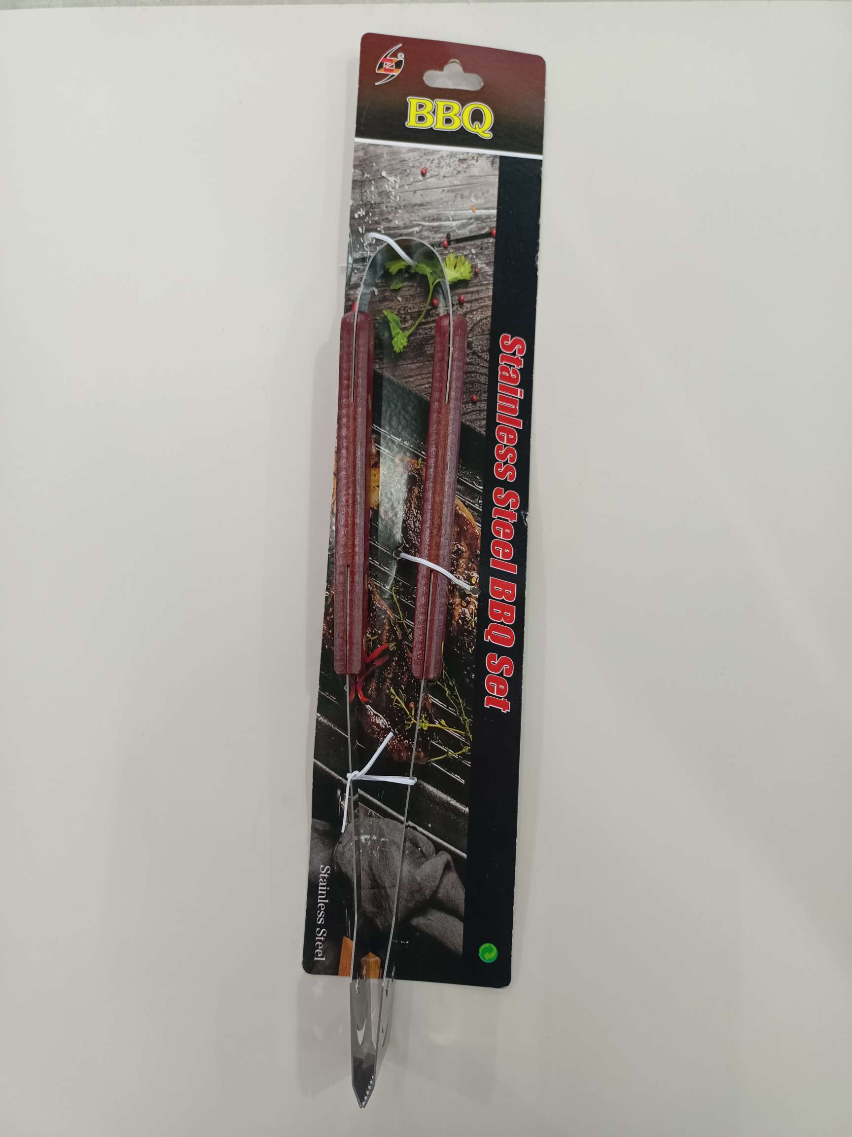 红木手柄/不锈钢烤具/笑脸食品夹产品图