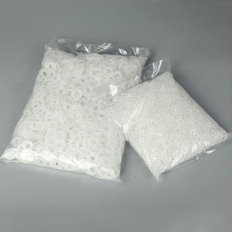 气眼塑料垫片/槽扣塑胶垫片/透明PVC垫白底实物图