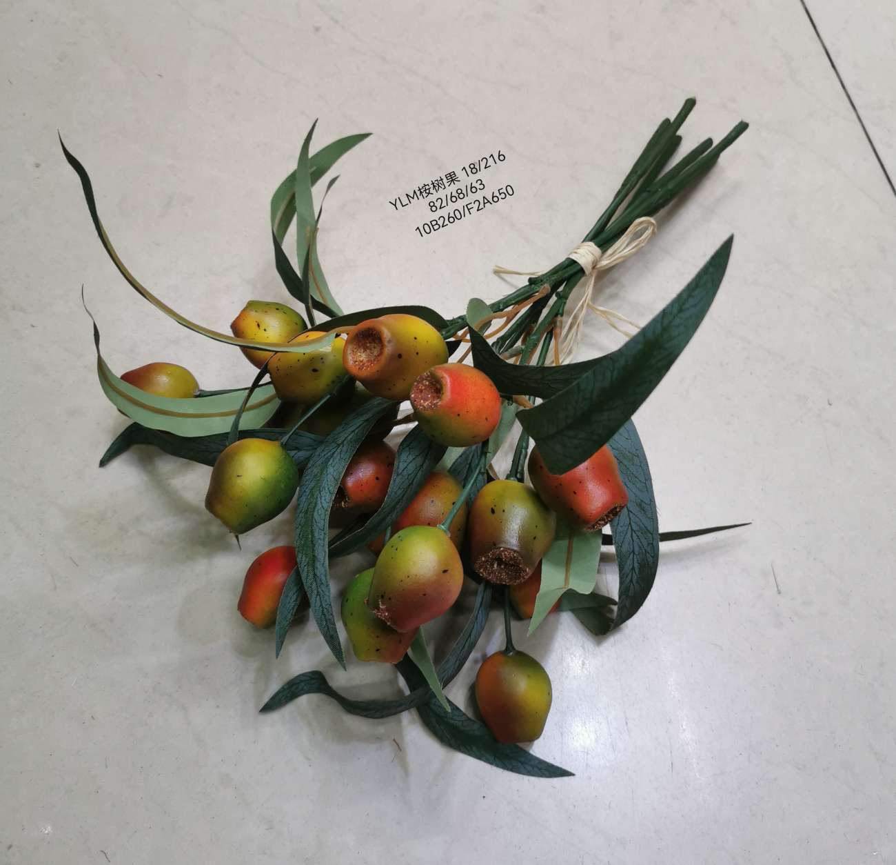 Wedding video: The bride holds a bouquet of flowers and makes a bouquet. Home decoration: living room, conference hall, hotel lobby. Realistic hand-made eucalyptus fruits are placed detail image 2