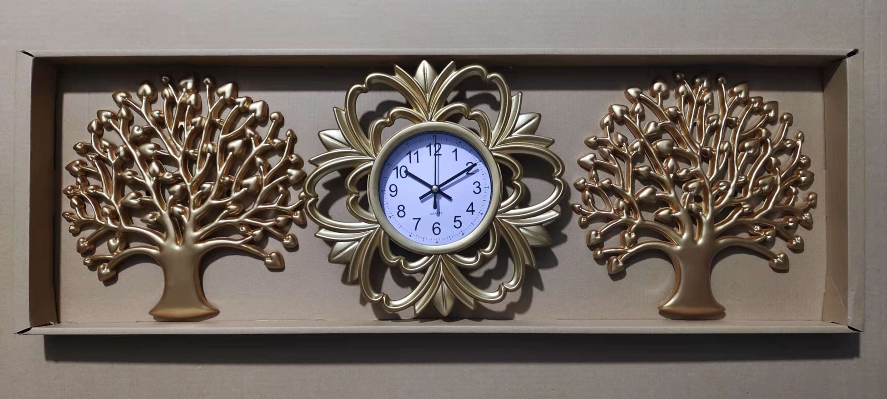 One clock and two trees are hanging clocks