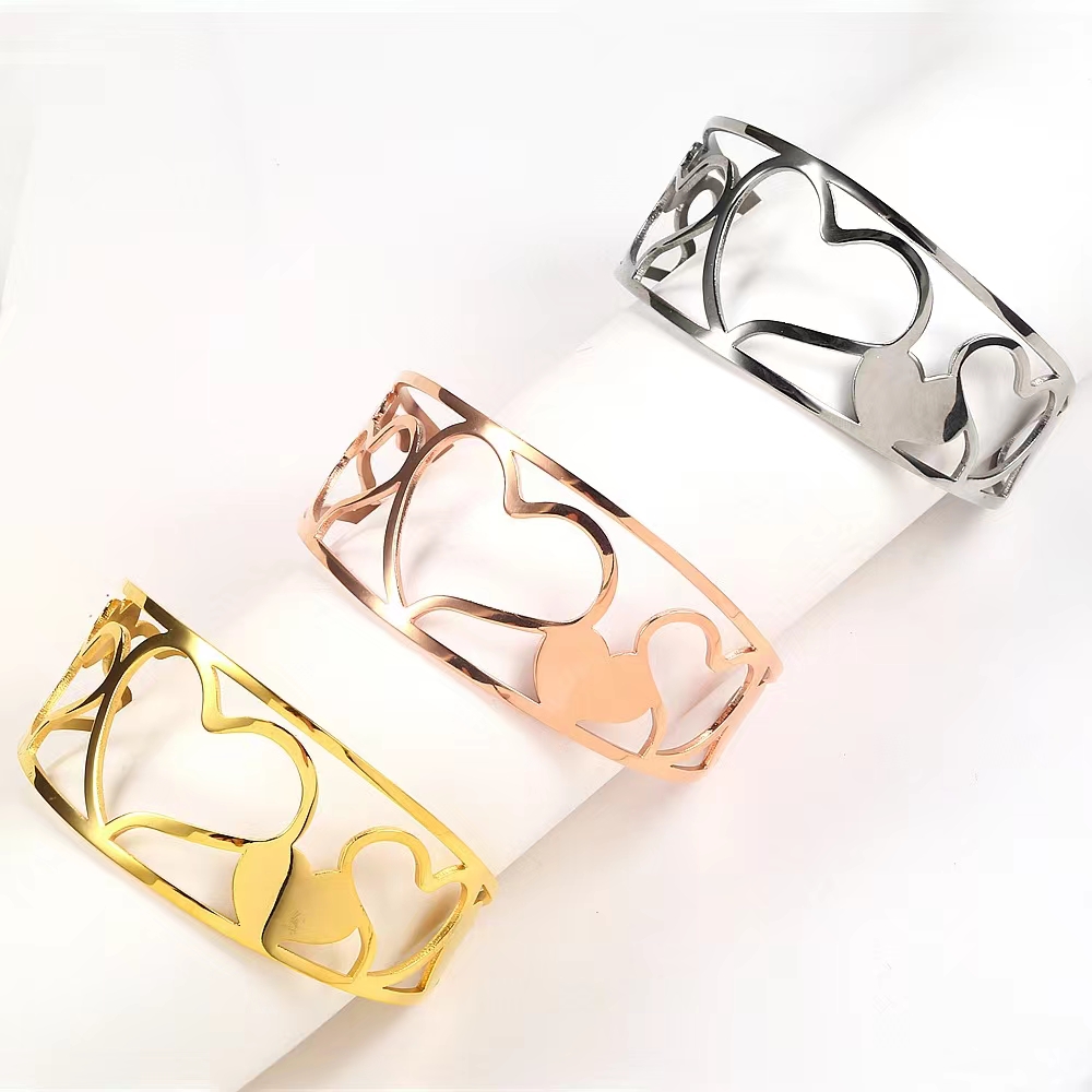 New stainless steel wrist accessories, heart-shaped hollowed-out wide open bracelet and wristband, ladies' titanium steel wrist accessories detail image 3