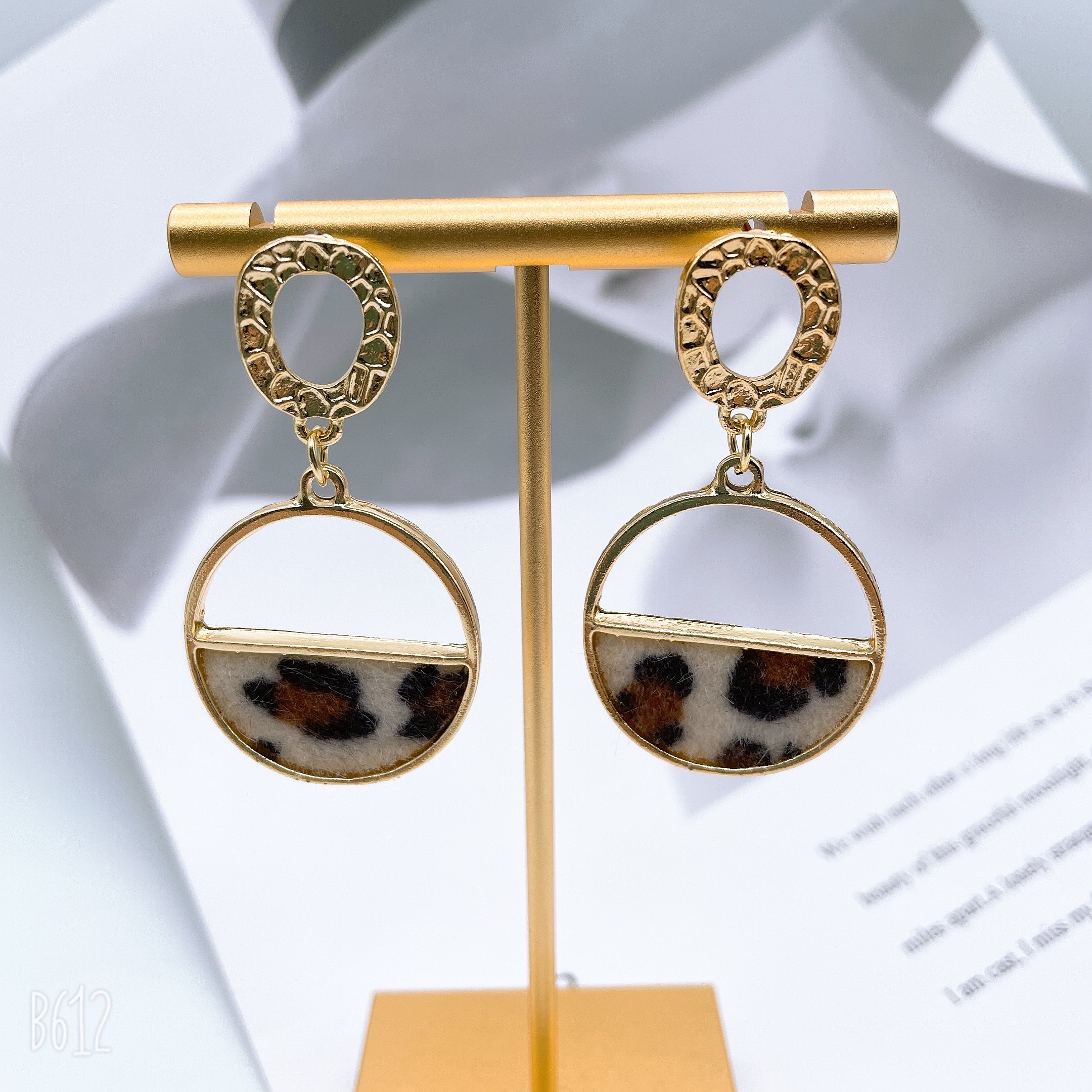 The new earrings from Dongdaemun, South Korea, feature leopard print multi-color earrings that are fashionable and versatile. They are popular and trendy earrings, including women's semi-circular hollowed-out stud earrings Item Picture