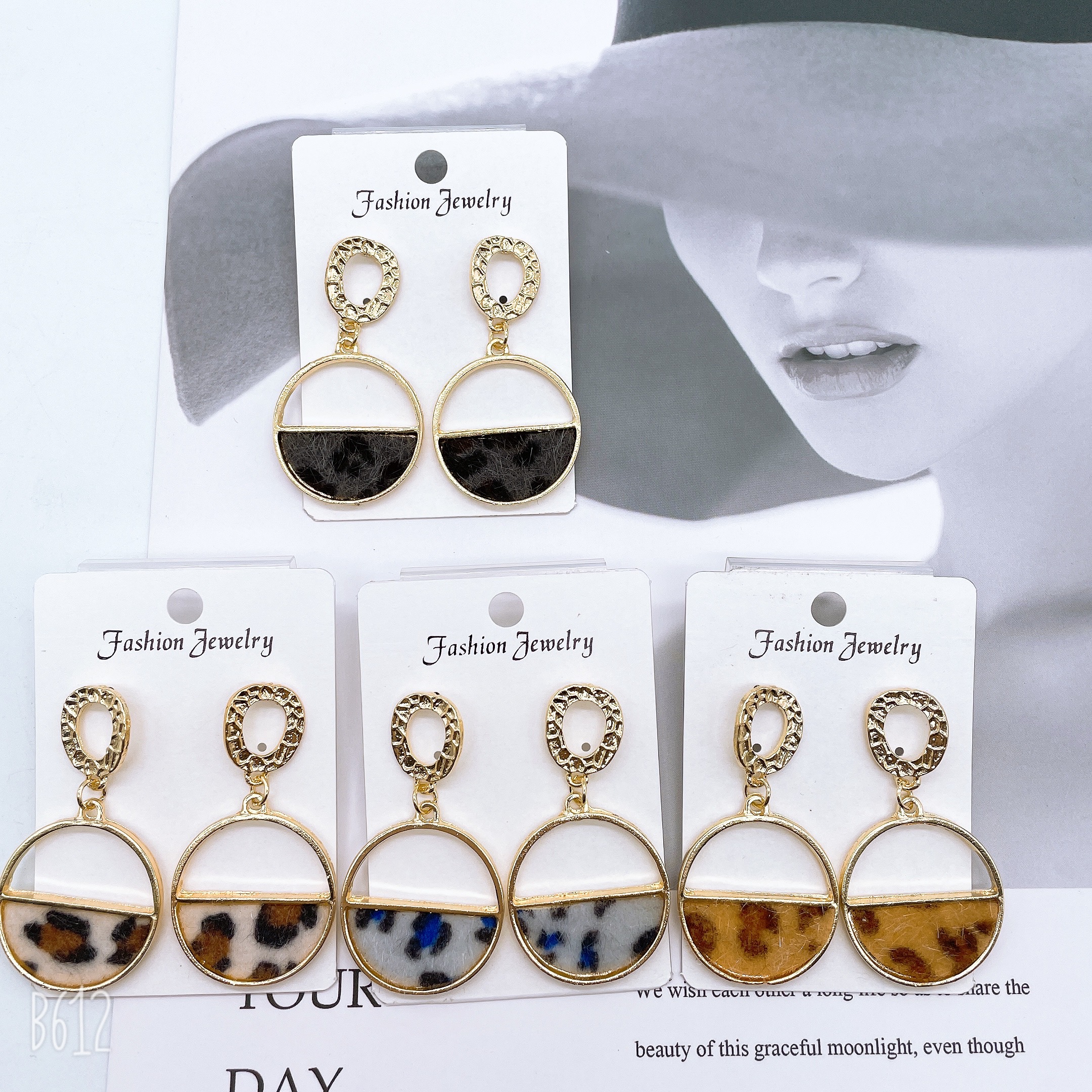 The new earrings from Dongdaemun, South Korea, feature leopard print multi-color earrings that are fashionable and versatile. They are popular and trendy earrings, including women's semi-circular hollowed-out stud earrings