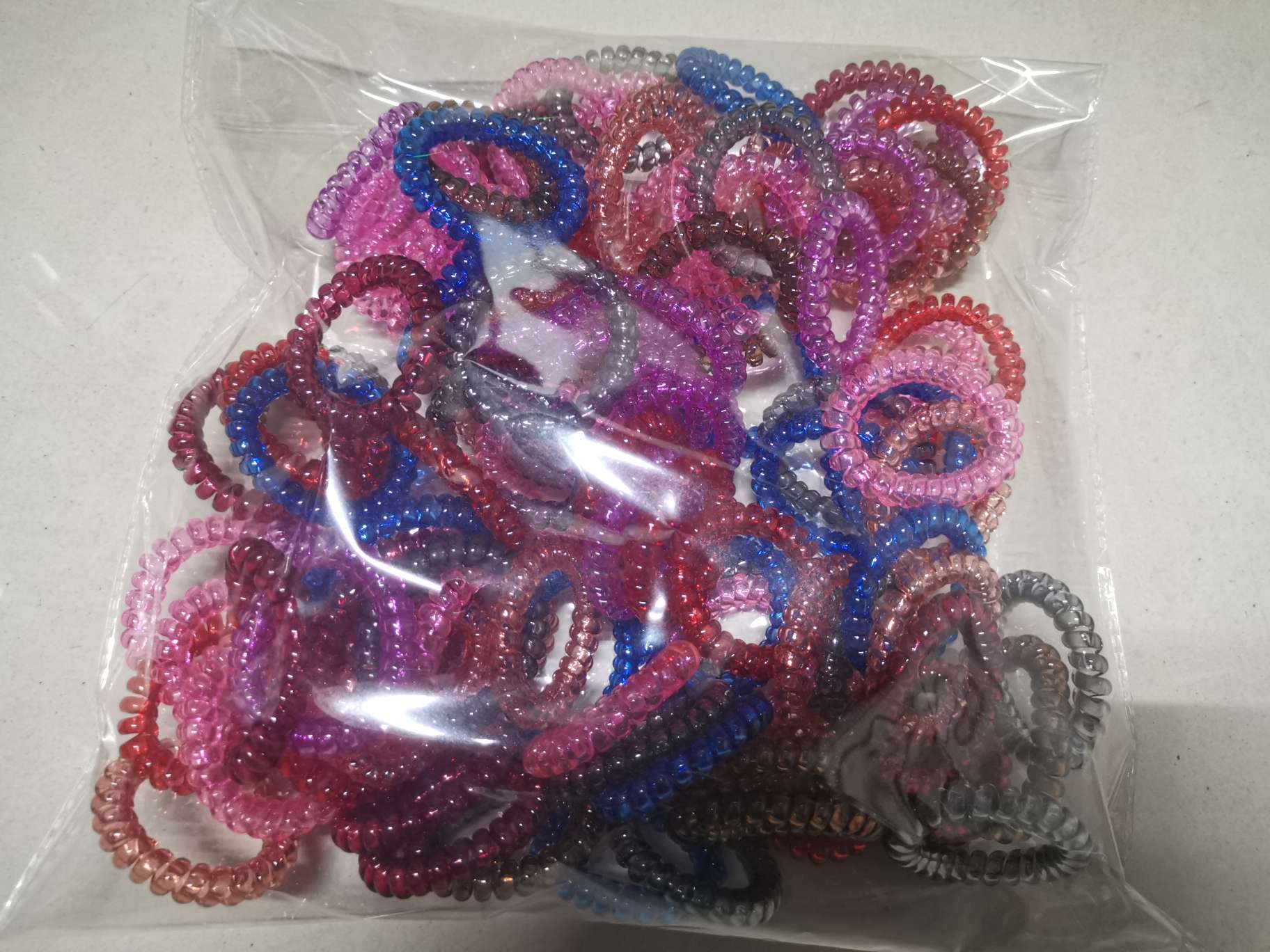 A set of 100 pieces each of the high-elasticity and thickened matte mixed style hair accessory mixed style and color