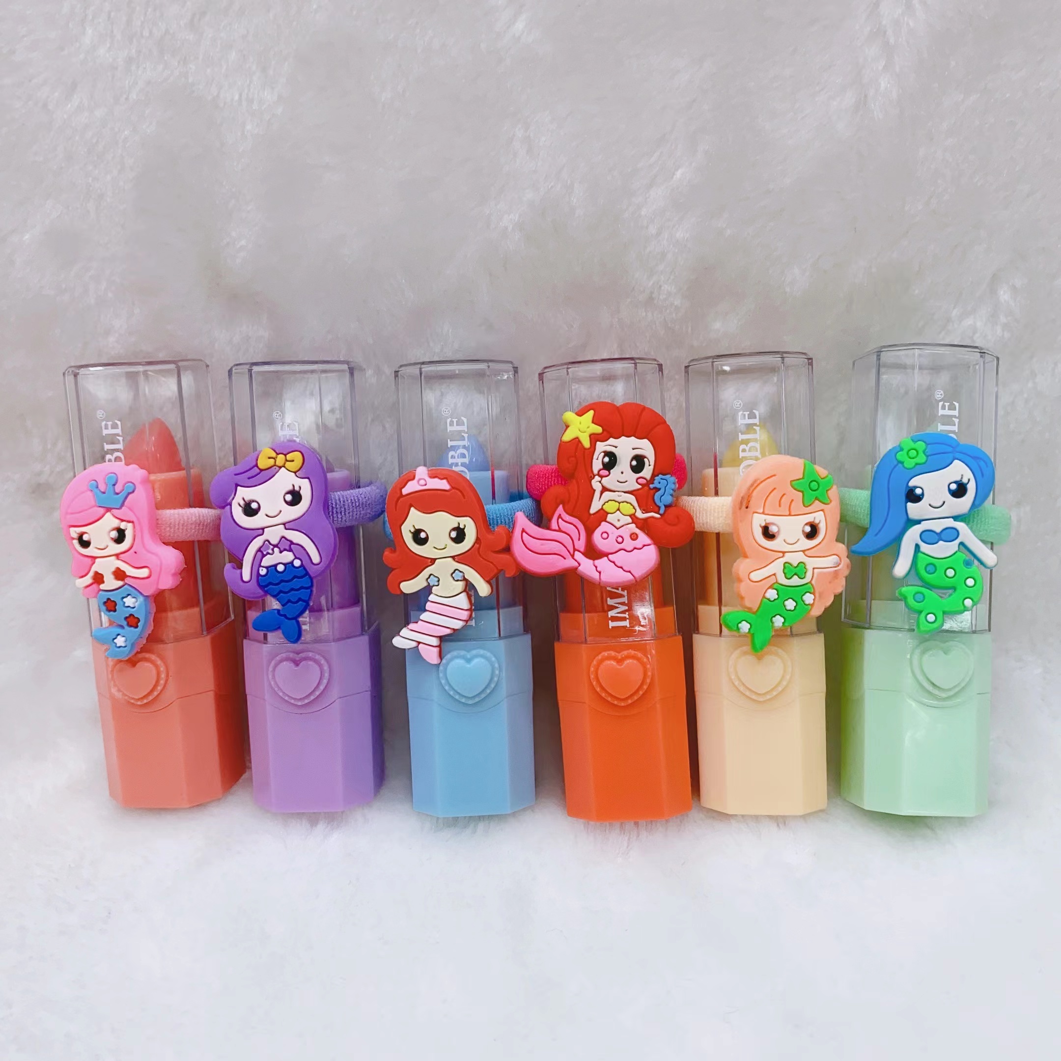 变色唇膏/滋润保湿/美人鱼戒指/小皮筋可两用/经典款式/时尚设计/女性必备/自然色彩/小巧精致/高性价比细节图