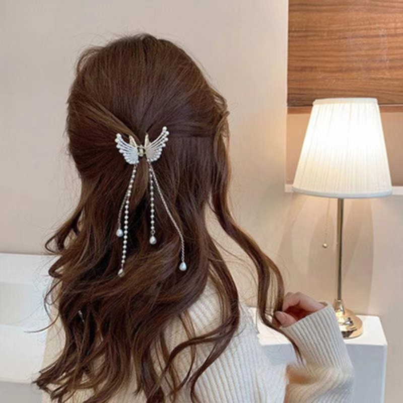 Elegant diamond-encrusted angel wing tassel small grab clip pearl flower butterfly hair clip design sense shark clip national trend series Application Scenario