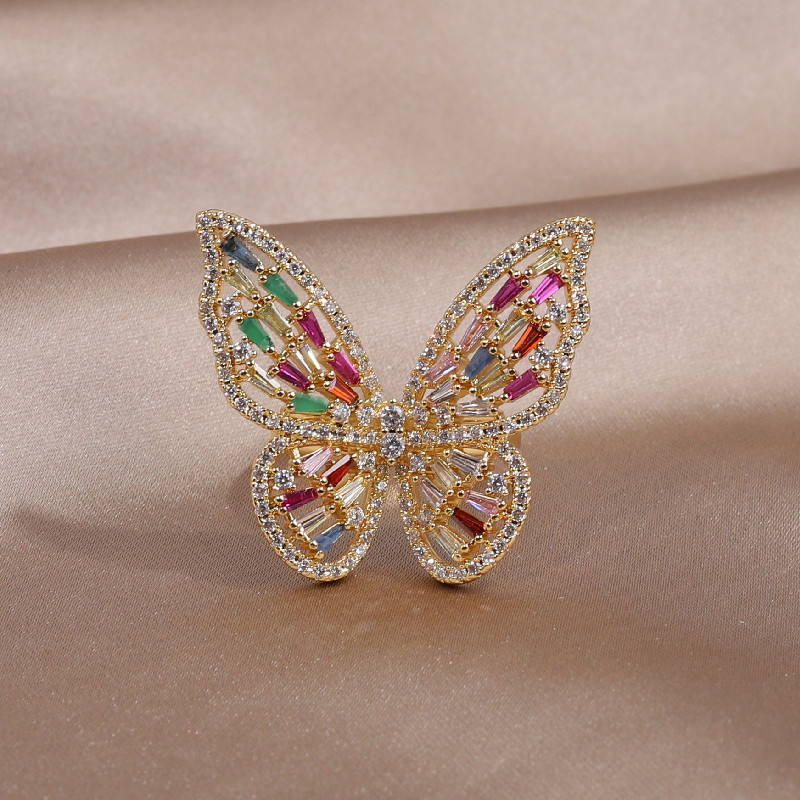 Hot-selling fashion jewelry, exaggerated and luxurious copper-inlaid colored zircon butterfly ring earrings set for women detail image 6