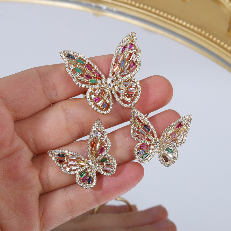 Hot-selling fashion jewelry, exaggerated and luxurious copper-inlaid colored zircon butterfly ring earrings set for women detail image 2