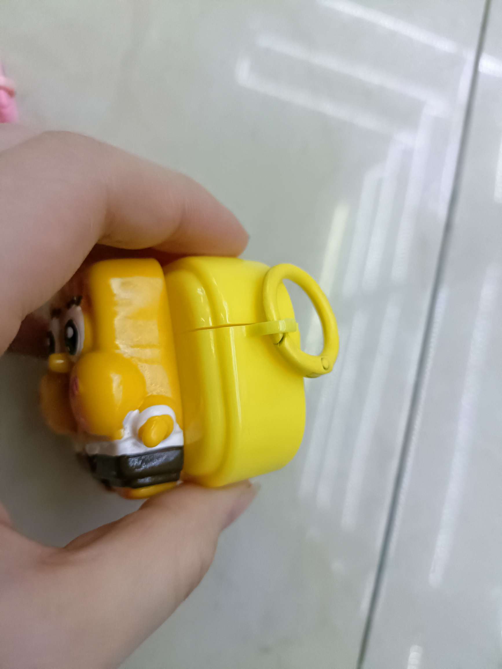 The soft shell of the Bluetooth headset case is pasted with cartoon dolls detail image 6