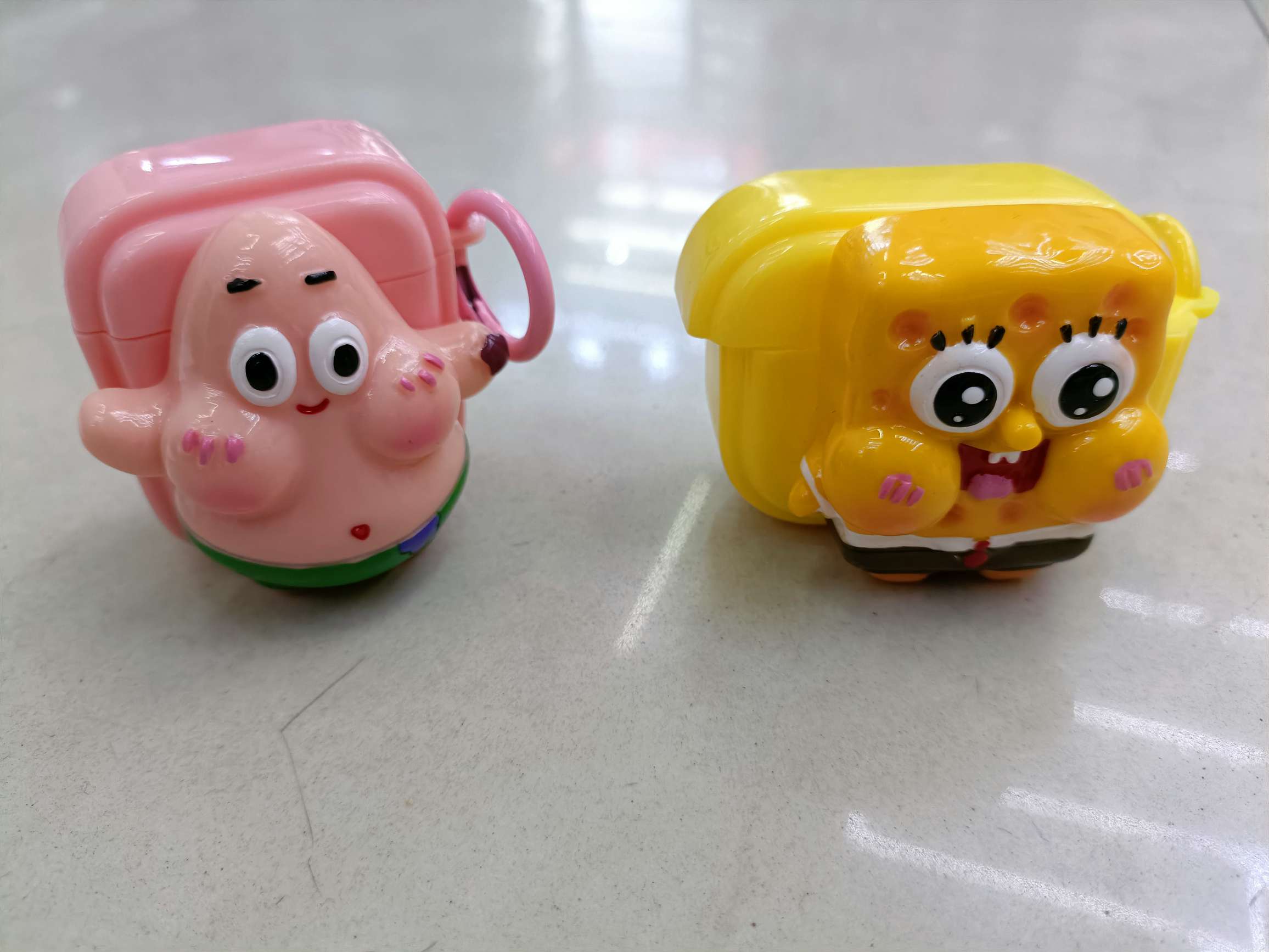 The soft shell of the Bluetooth headset case is pasted with cartoon dolls detail image 9