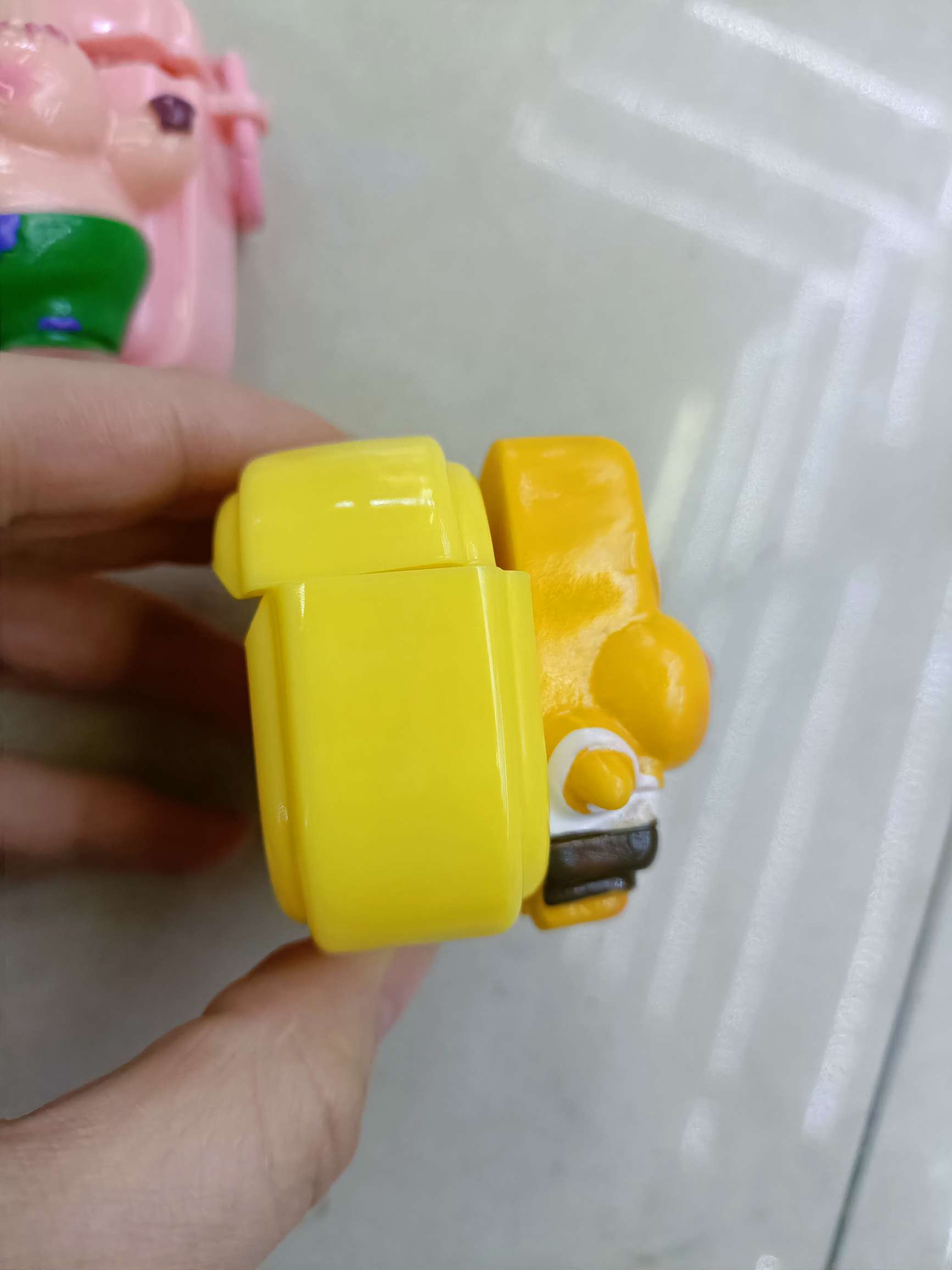The soft shell of the Bluetooth headset case is pasted with cartoon dolls detail image 7