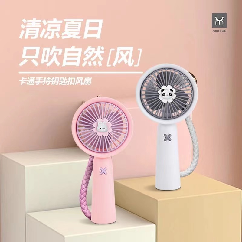 A popular cartoon keychain mini fan with USB charging, a portable handheld student fan with strong wind force for going out details Picture