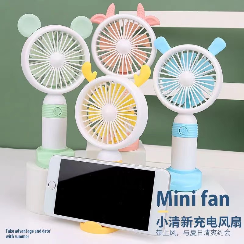Creative cartoon USB handheld desktop charging mini fan for children and students, outdoor portable stand mini fan Item Picture