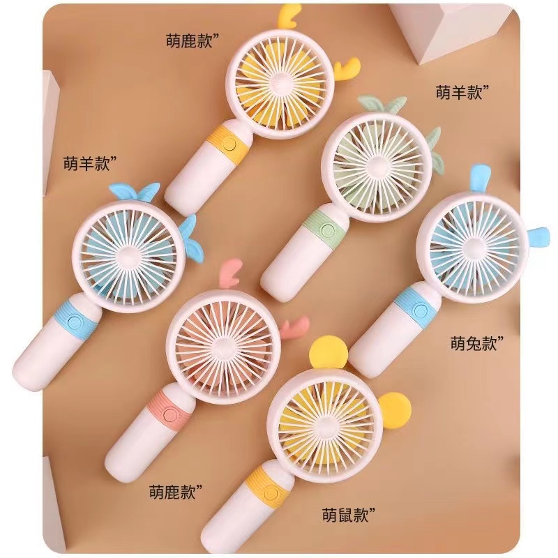 Creative cartoon USB handheld desktop charging mini fan for children and students, outdoor portable stand mini fan