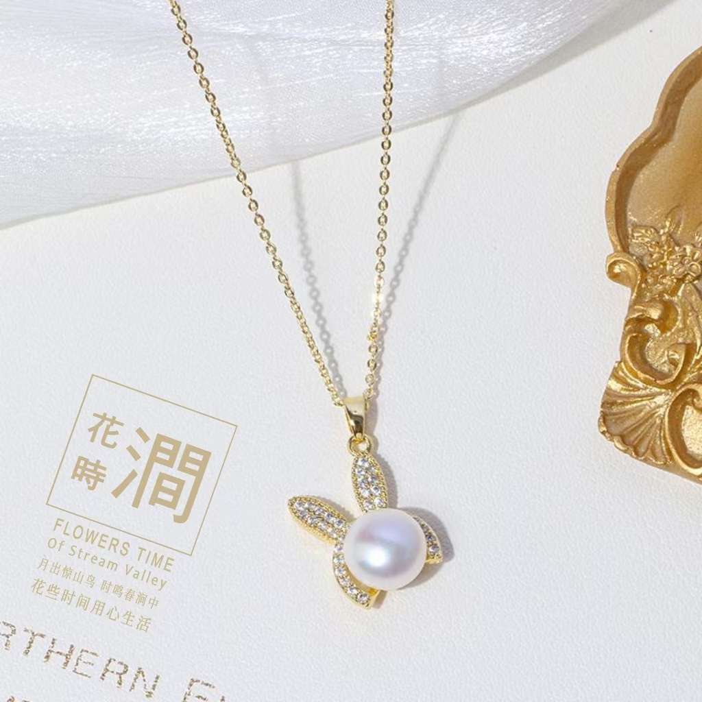 Light luxury zirconium little rabbit pearl earrings for women 2023, trendy and high-end style, stud earrings, zodiac year earrings set detail image 2