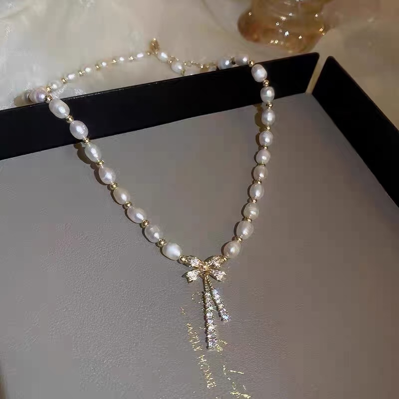 Natural freshwater pearl necklace, light luxury, niche bow necklace, collarbone chain, feminine charm Specification image