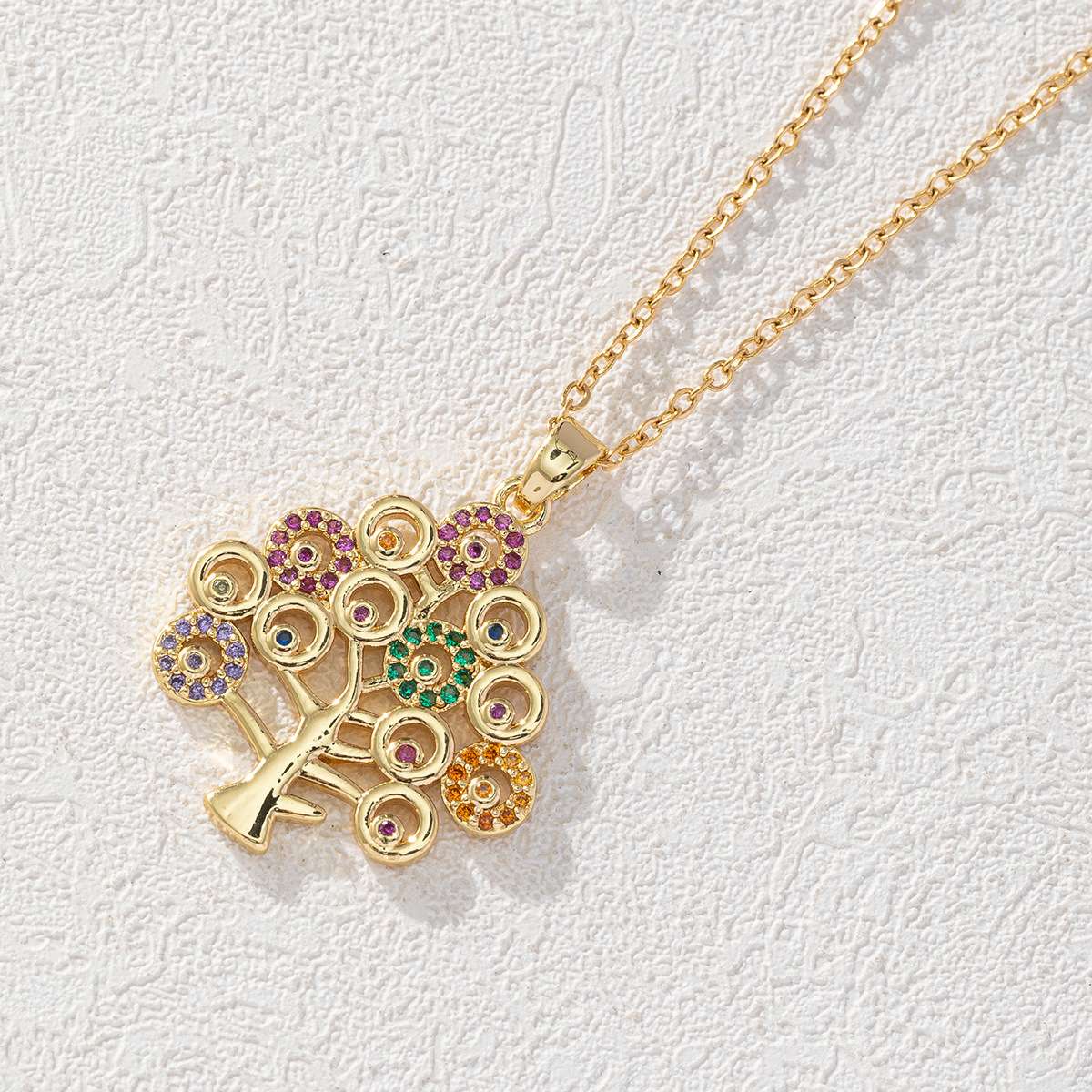 European and American fashion light luxury creative lucky tree pendant, slightly inlaid zircon necklace, women's niche exquisite cross-border sweater chain detail image 6