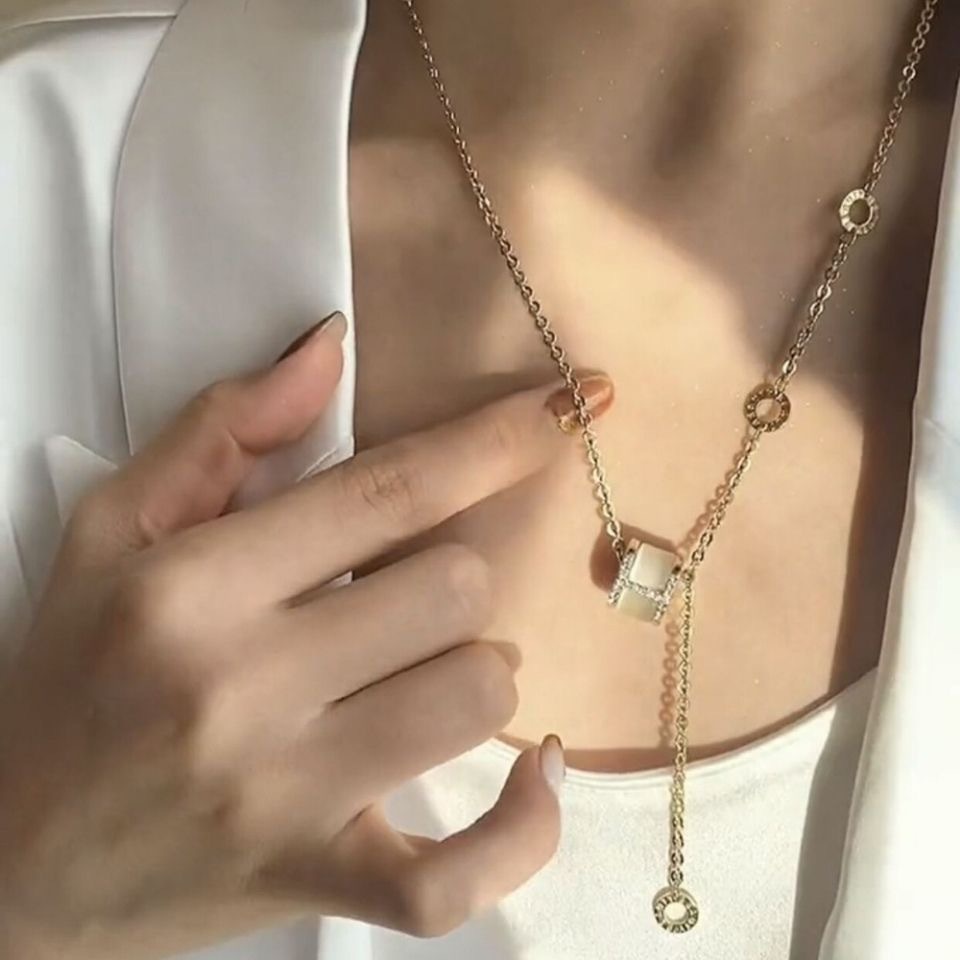 Hollowed-out four-leaf clover pendant necklace, collarbone chain, stud earrings, stainless steel seven-color chain wholesale 165 Item Picture