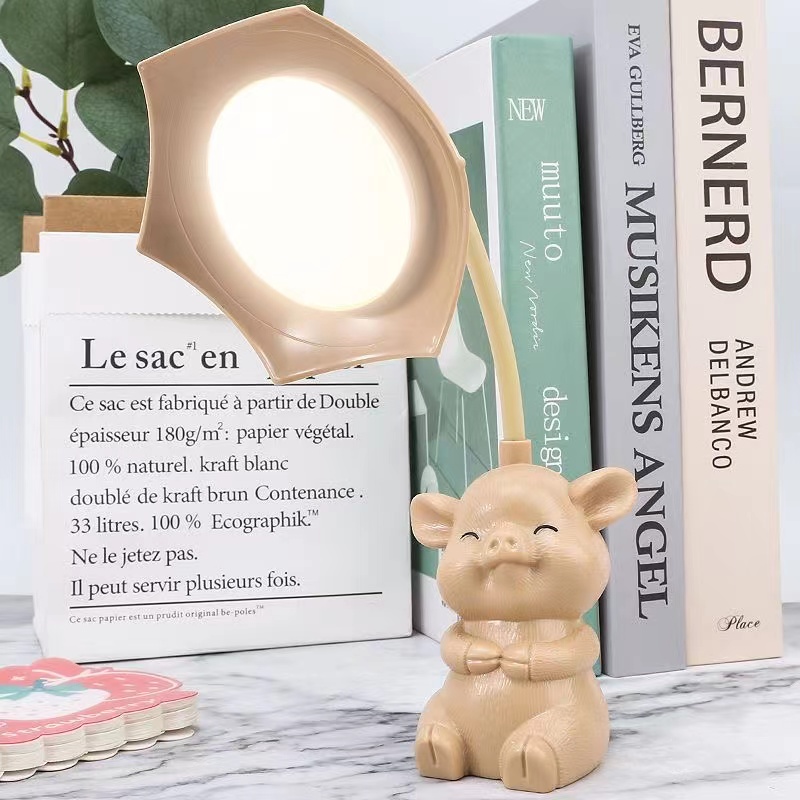Cute little pig desk lamp for boys, girls, children, writing and reading, student eye-protecting lamp, USB charging, creative bedside night lamp Application Scenario