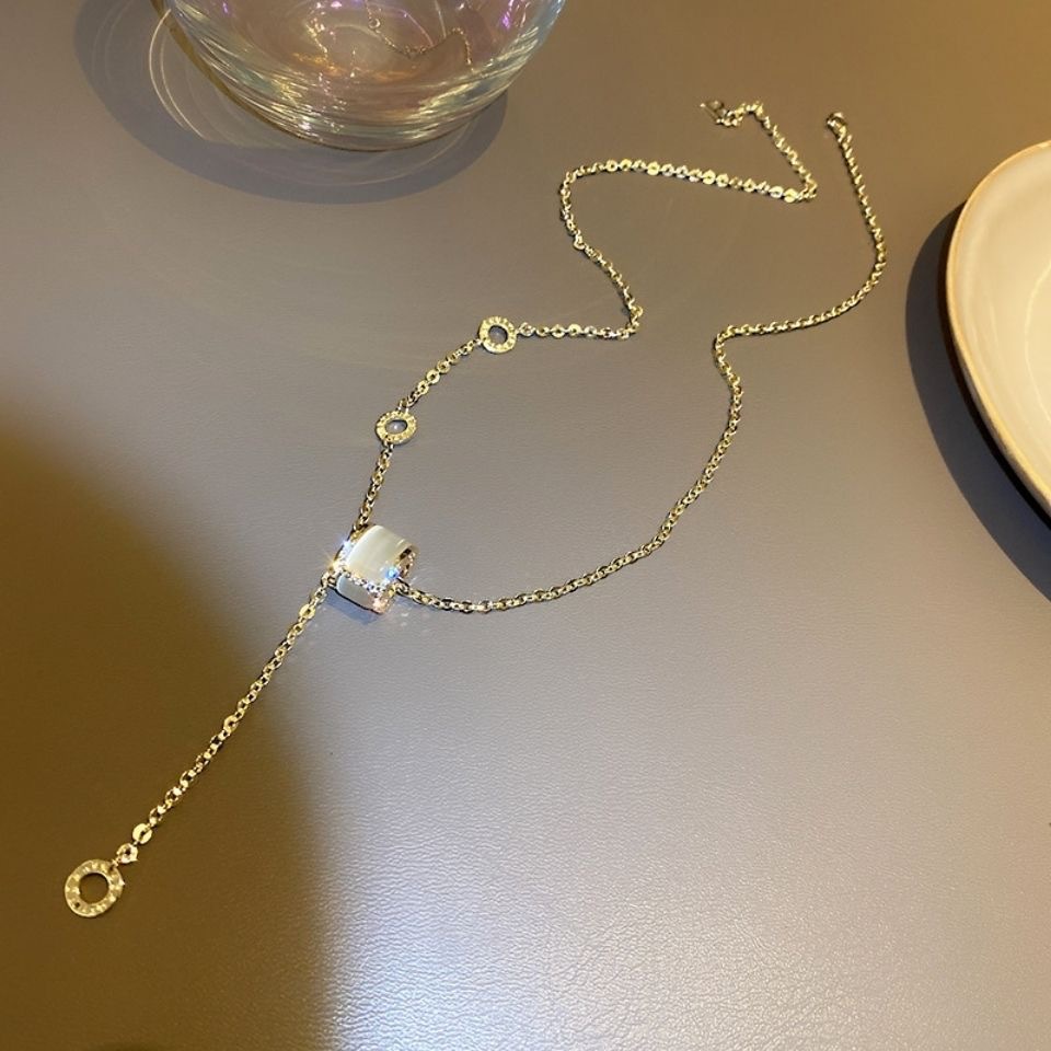 Hollowed-out four-leaf clover pendant necklace, collarbone chain, stud earrings, stainless steel seven-color chain wholesale 165 details Picture