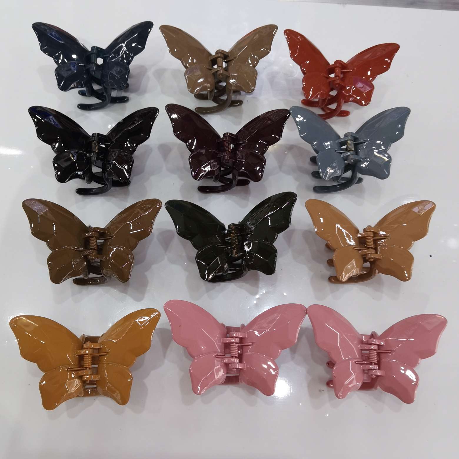 This is a popular and trendy Korean version of the fashion classic. It features 11-color butterfly hairpins with single-layer and double-layer hollowed-out flat butterflies details Picture