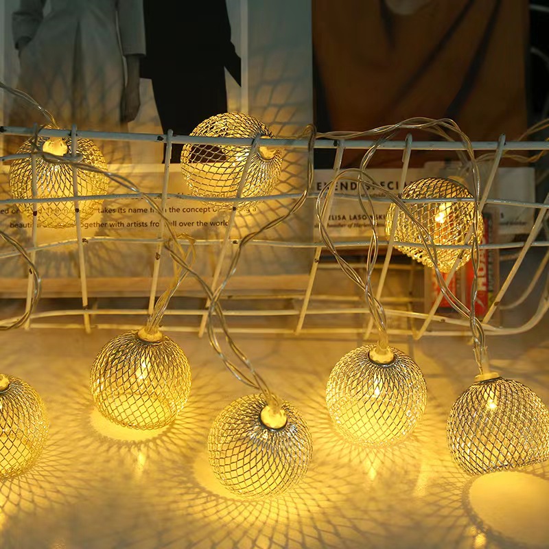 LED light strings, hollowed-out ball light strings, iron art lanterns, round balls, romantic decorative small string lights, festive atmosphere colorful lights