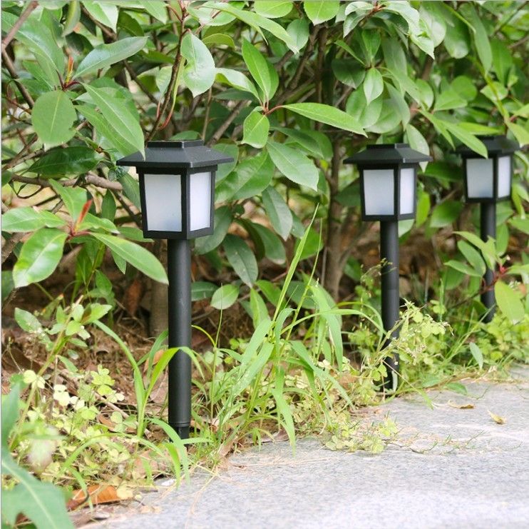 Solar outdoor garden lights, household waterproof garden and villa ground insert lawn lights, landscape decoration flame small palace lights Application Scenario