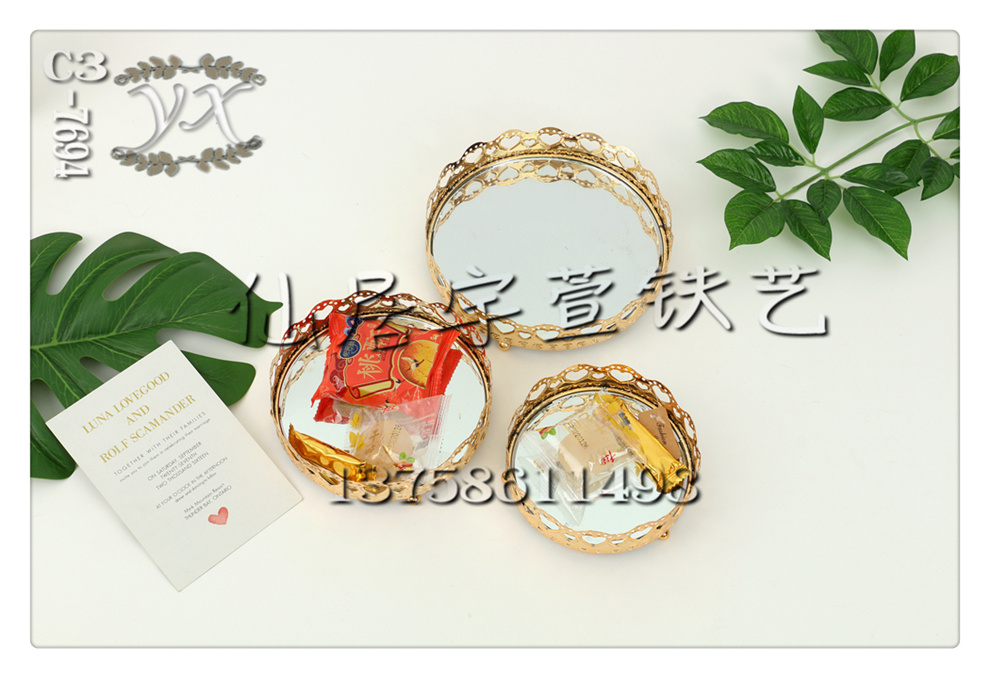 Yuxuan Ironwork offers a variety of specifications, including European-style round-mouth glass mirror hollowed-out ironwork fruit plates, living room household coffee tables, candy and snack basins. 52 Specification image