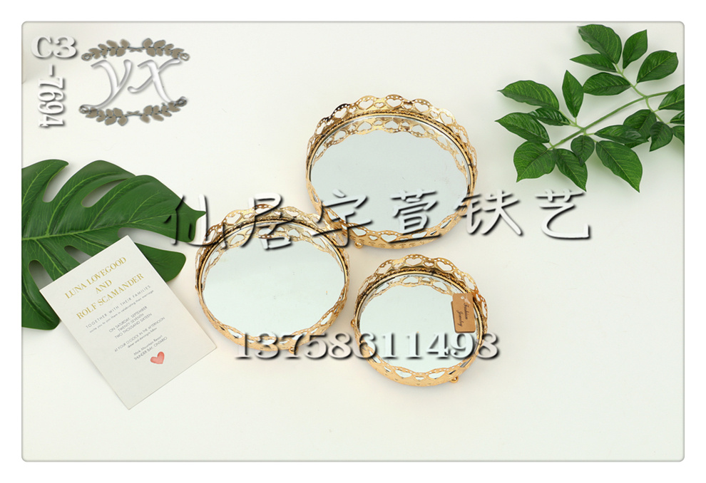 Yuxuan Ironwork offers a variety of specifications, including European-style round-mouth glass mirror hollowed-out ironwork fruit plates, living room household coffee tables, candy and snack basins. 52 details Picture