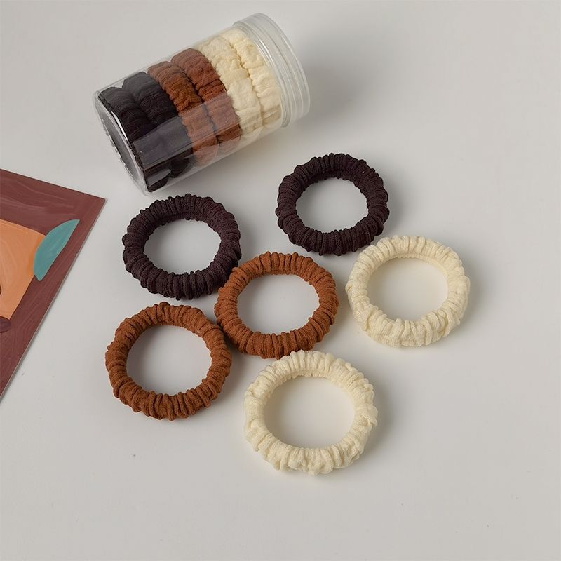 The high-quality, elastic bun hair tie is simple and fashionable. The thick rubber band women's hair tie is durable and won't damage the hair. Hair tie Specification image