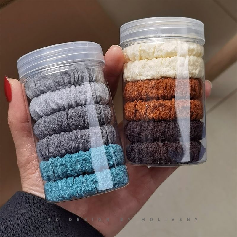 The high-quality, elastic bun hair tie is simple and fashionable. The thick rubber band women's hair tie is durable and won't damage the hair. Hair tie details Picture