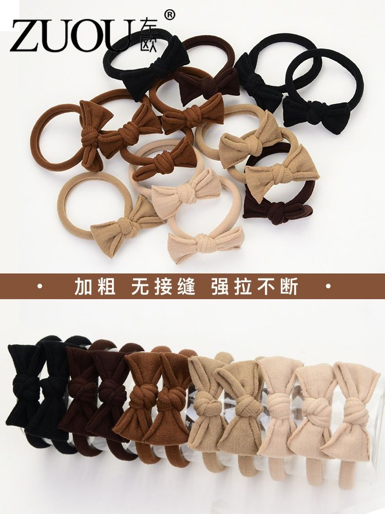 A high-end hair tie for women, a delicate leather band tied into a ponytail bun details Picture