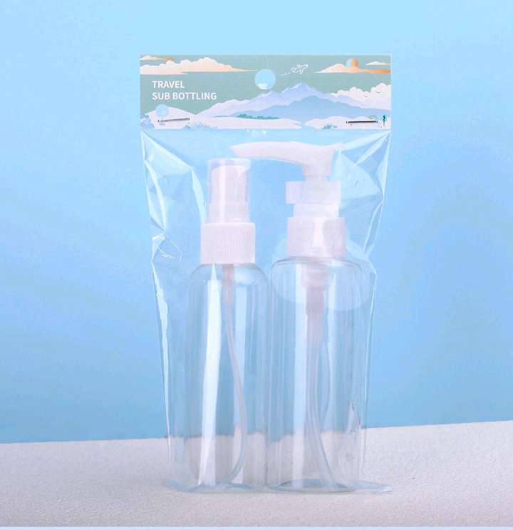 Two portable lotion bottles and spray bottles.