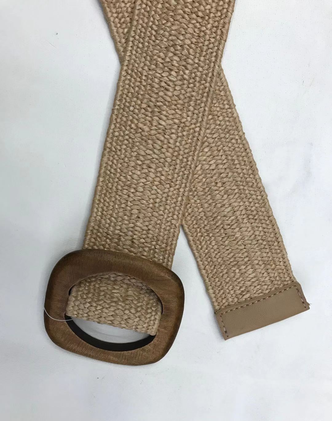 A fashionable and versatile grey woven wide belt for women's outerwear, summer dress with a cinched waist belt
