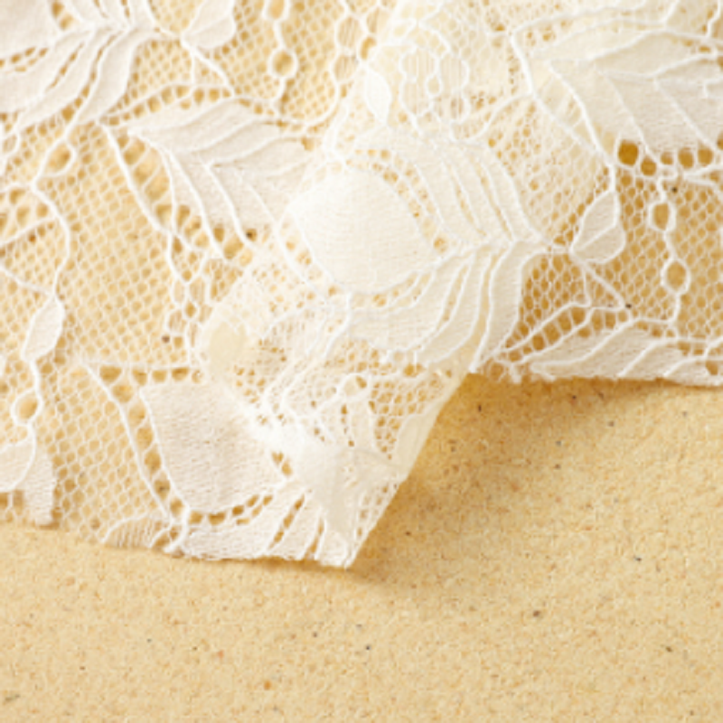 春夏蕾丝布料厂家供应 镂空刺绣蕾丝面料女装半身裙吊带辅料现货
